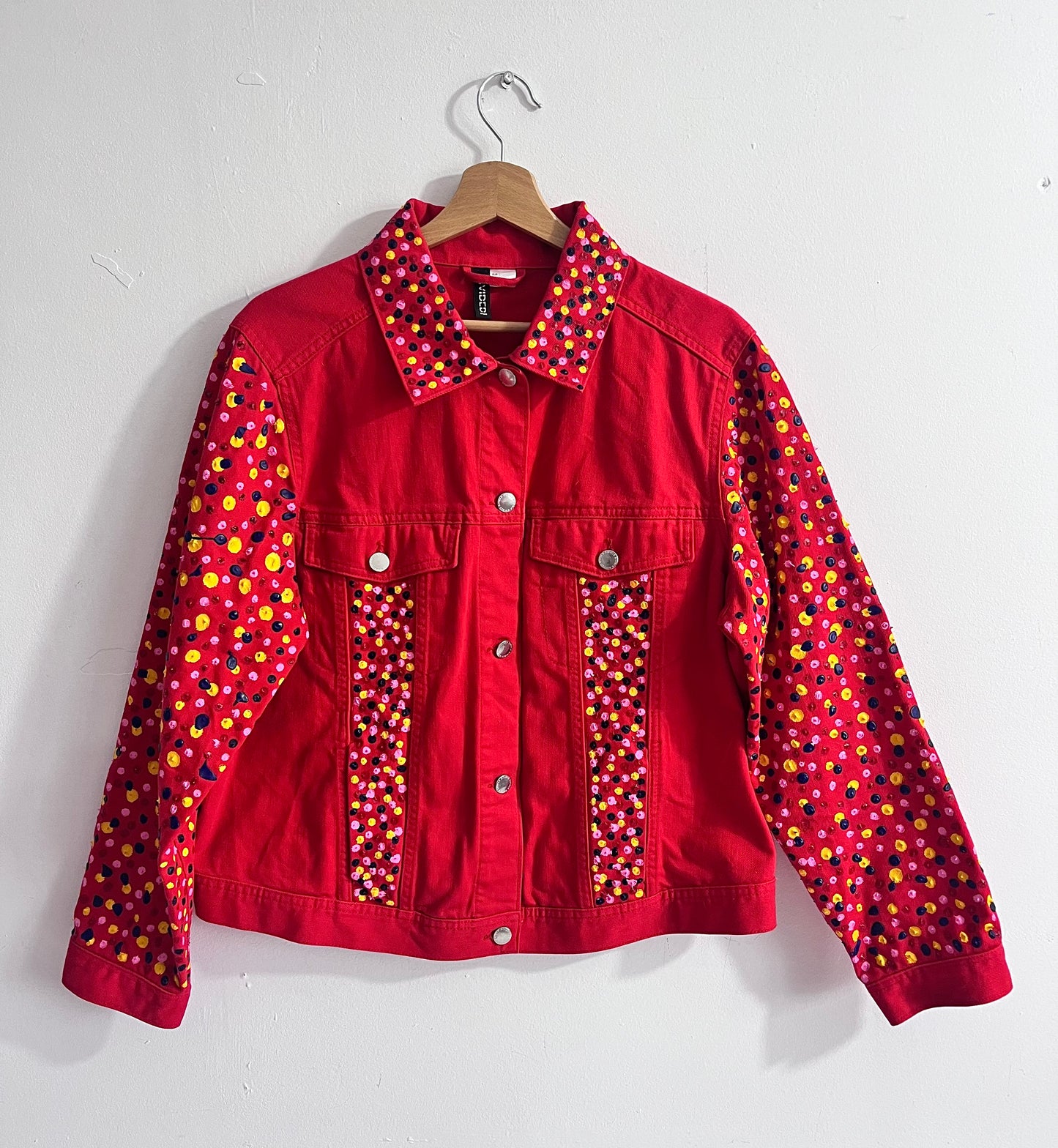 Red jacket with colorful spikes