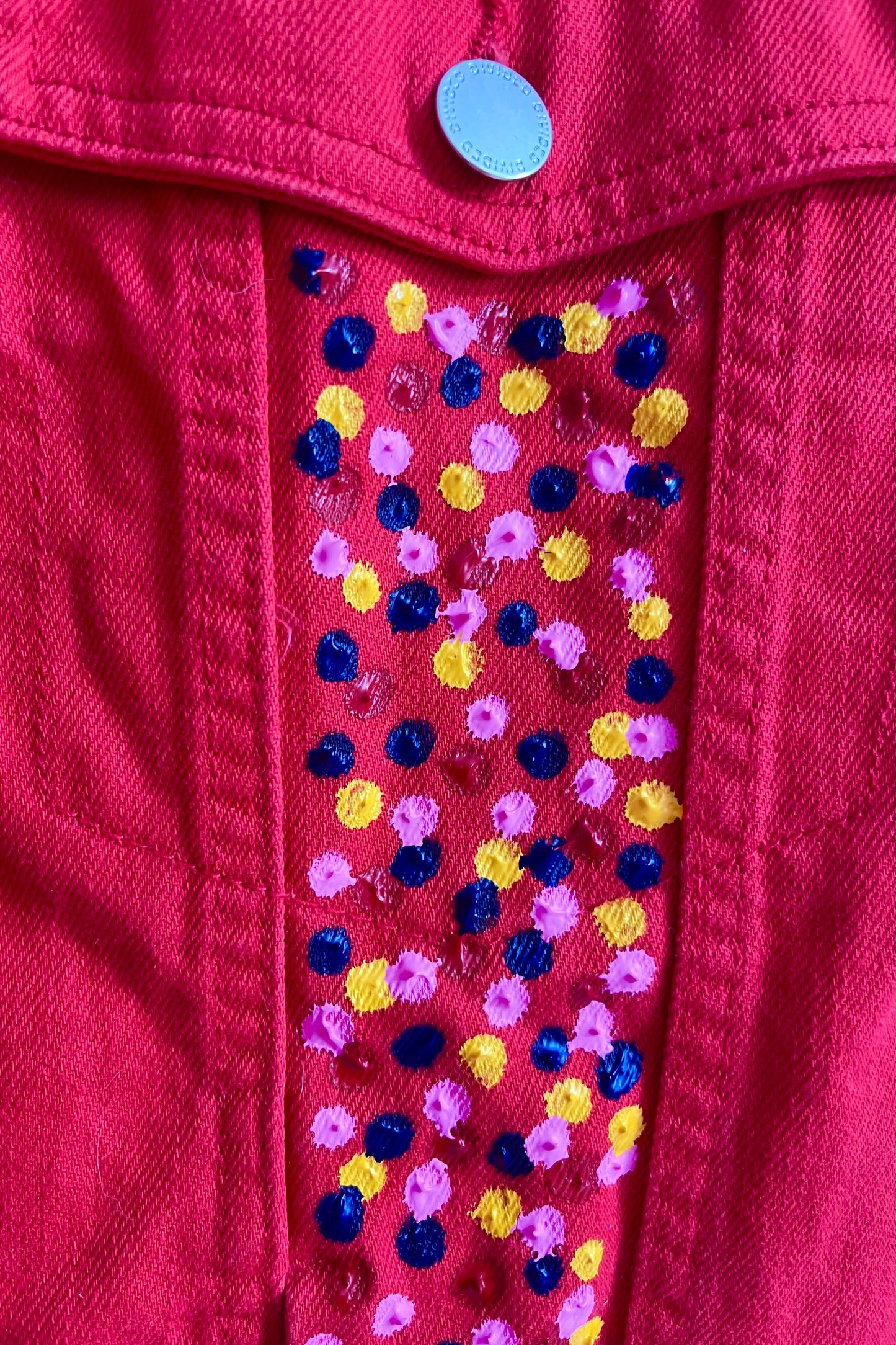 Red jacket with colorful spikes