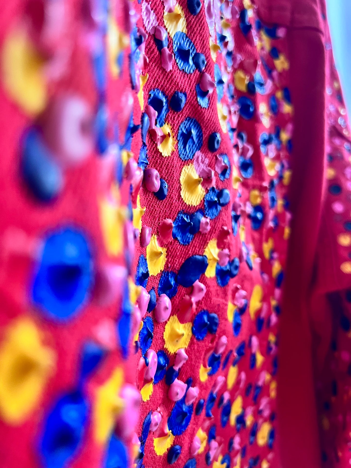 Red jacket with colorful spikes